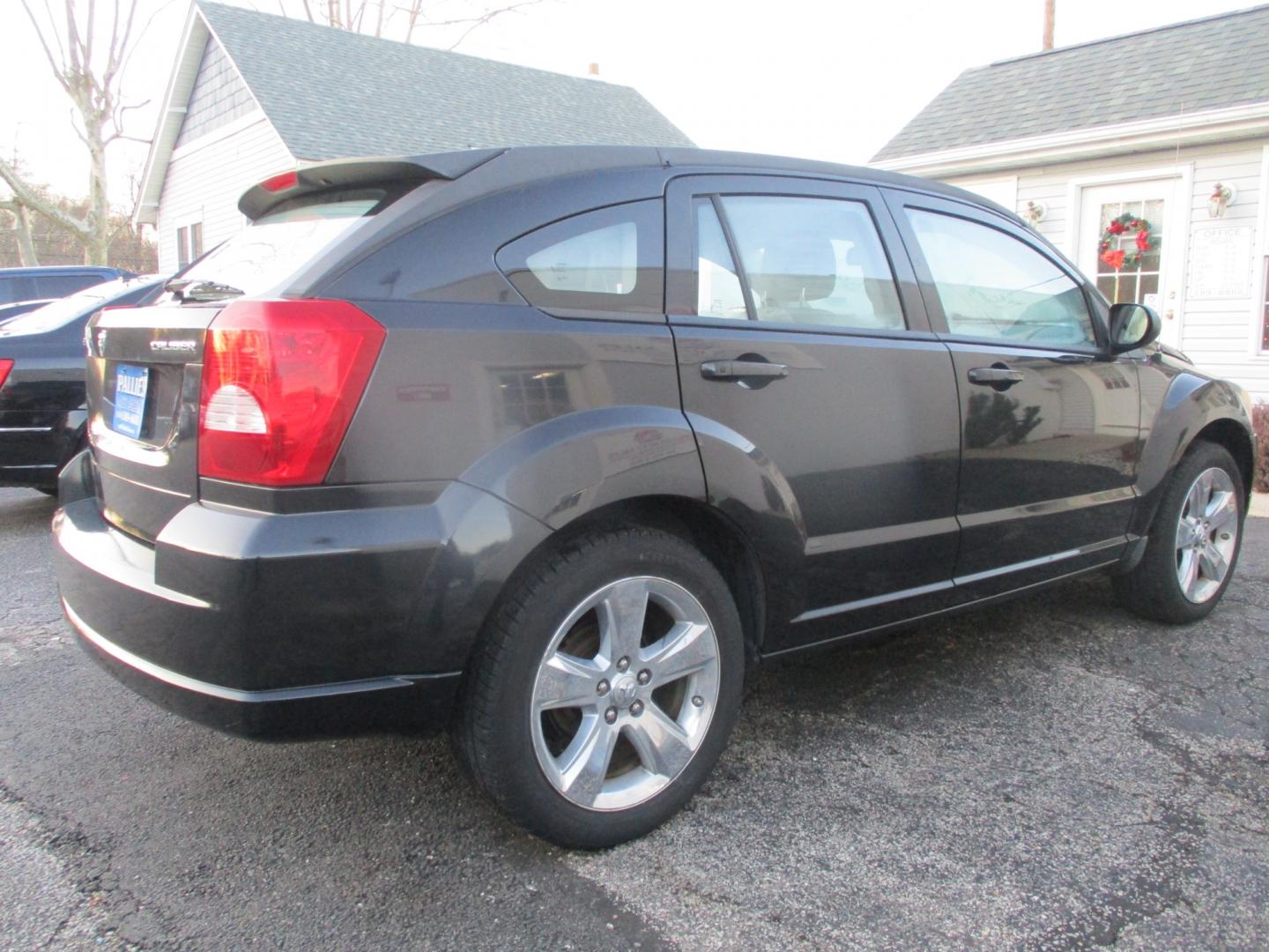 2011 BLACK Dodge Caliber Uptown (1B3CB9HB0BD) with an 2.4L L4 DOHC 16V engine, Continuously Variable Transmission transmission, located at 540a Delsea Drive, Sewell, NJ, 08080, (856) 589-6888, 39.752560, -75.111206 - Photo#6